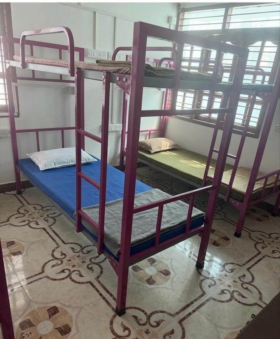 Women's PG room in Tambaram at Kani Women's PG - Six Sharing Room